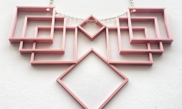 TITLE: BLUSH PINK STATEMENT NECKLACE SIZE: 
 Chain 20”, Pendant W4.25” x H3” MEDIUM: 3D printed PLA with silver-plated brass chain. PRICE: $19.20 (free shipping)
