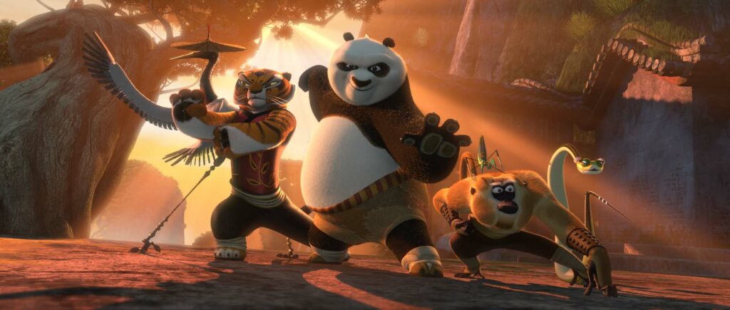 Cartoon panda and tiger in kung fu pose