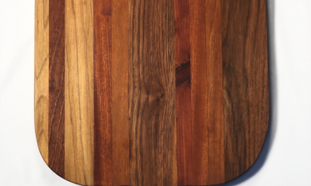 ITEM: Cutting Board
SIZE: 12” x 19 ¾” x ¾”DESCRIPTION: Black Walnut, mahogany, cedar, maple PRICE: $75