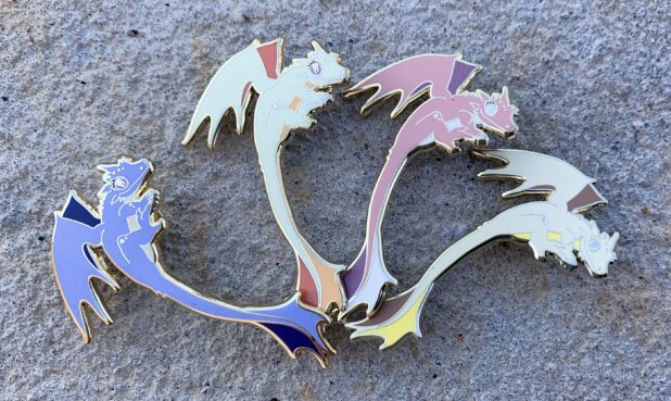ITEM: Gecko Dragon Pins
 DESCRIPTION: Blue, lily, pink, yellow PRICE: $14 each